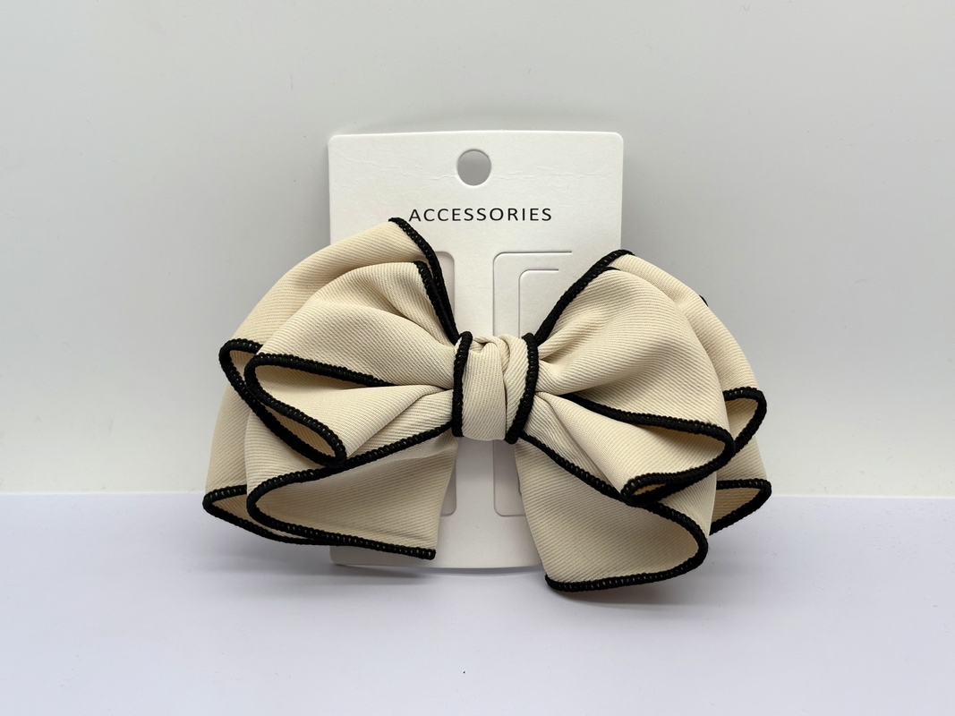Modische Creme-Bow-Clip mit verschiedenen Farbvarianten